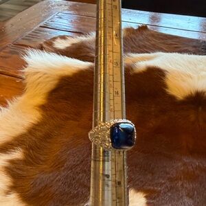 Elegant QVC lab created blue sapphire and diamonique ring